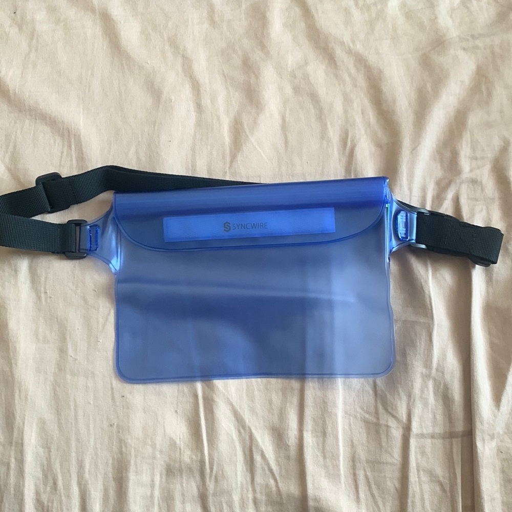 Unisex waterproof blue crossbody bag or fanny pack never used Original packaging